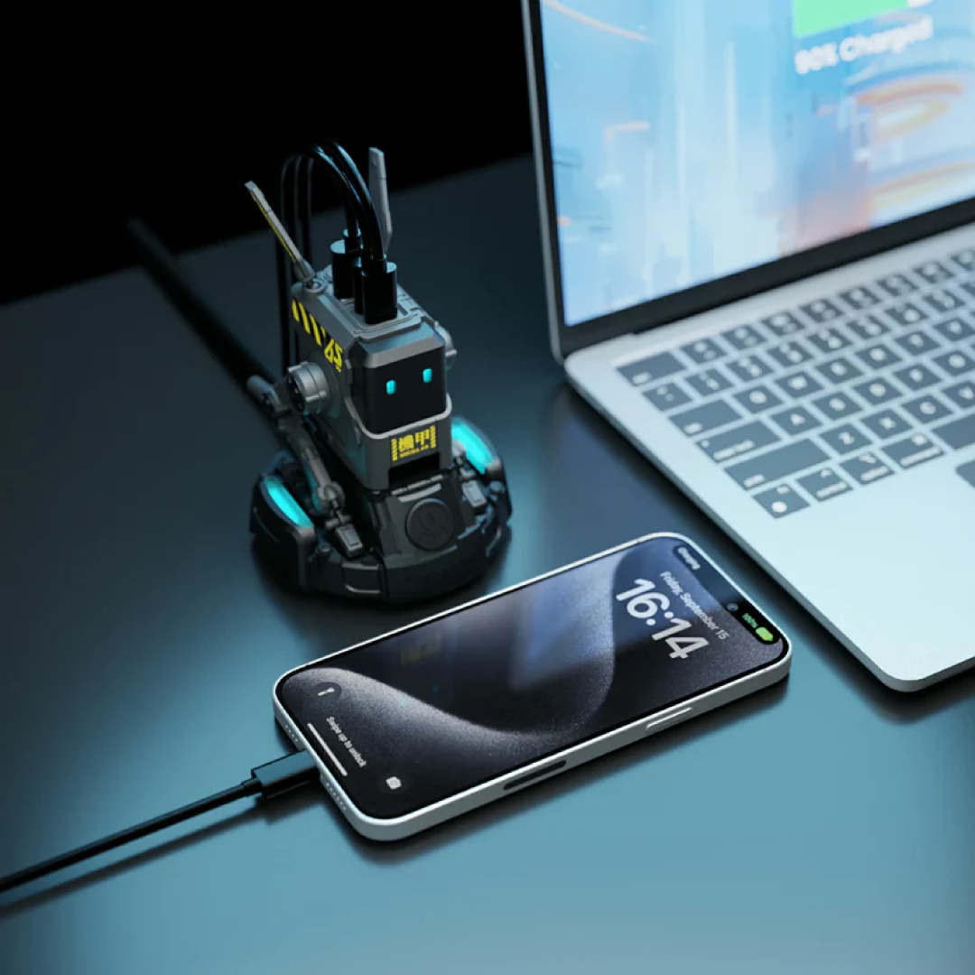 The Alpha65 Gray is the GaN 65W fast charger from GravaStar in a darker, more neutral gray finish. It maintains the same specs and “mecha robot” styling as the other versions but with a more subtle aesthetic.